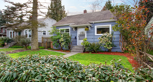 Exterior shot of a large house from the driveway