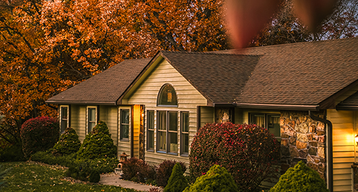 Exterior shot of a large house from the driveway
