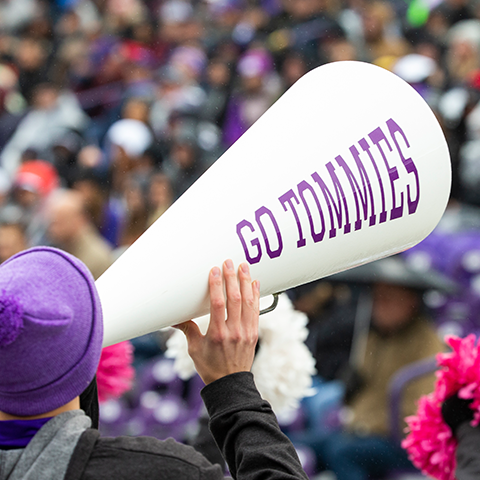 man at tommies game with a mega phone