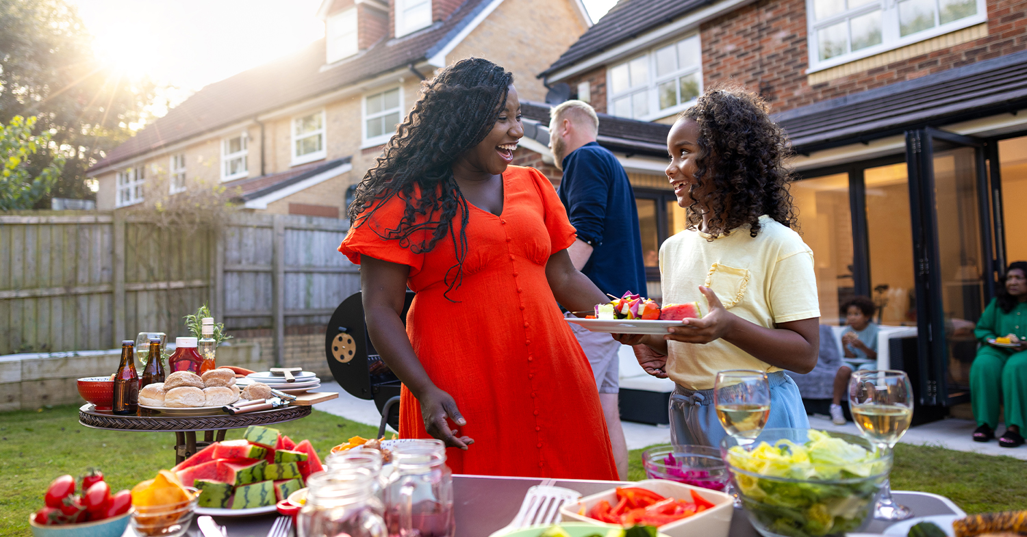 mother and daughter at a cookout_1500x785