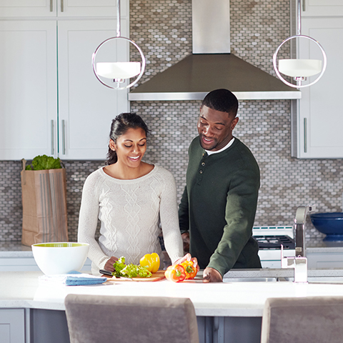 couple cooking new kitchen